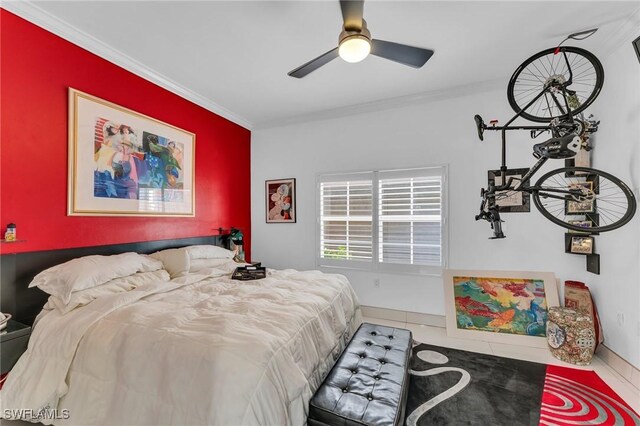 tiled bedroom featuring ceiling fan and ornamental molding