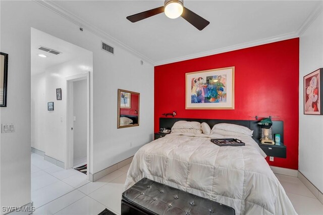 bedroom with light tile patterned floors, ceiling fan, and crown molding