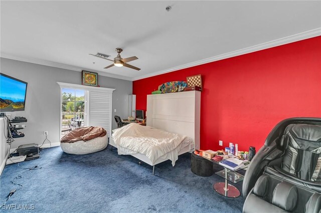 carpeted bedroom with ceiling fan and ornamental molding