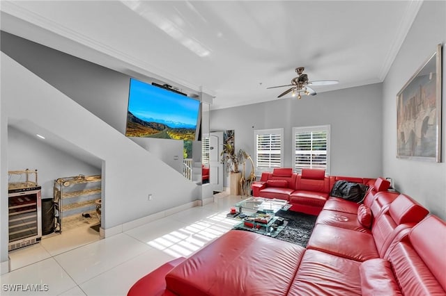 tiled living room featuring ceiling fan, beverage cooler, and ornamental molding