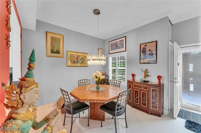 dining space featuring light tile patterned floors and crown molding