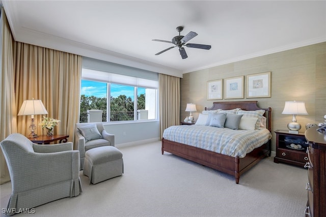 bedroom with crown molding, ceiling fan, and carpet