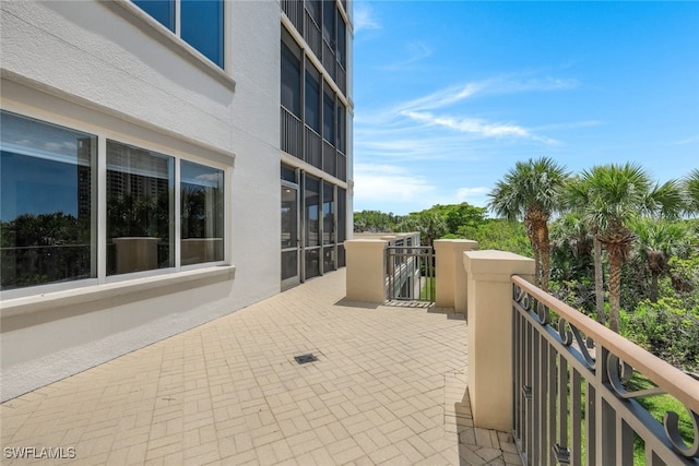 view of patio with a balcony