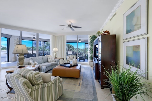 tiled living room featuring crown molding, a wealth of natural light, and ceiling fan