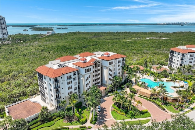 birds eye view of property featuring a water view