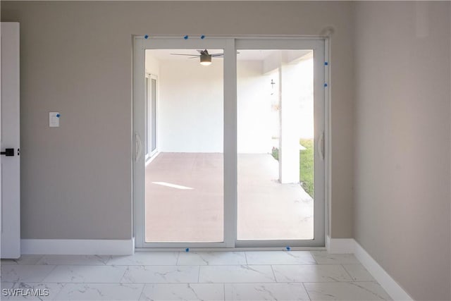 entryway featuring ceiling fan