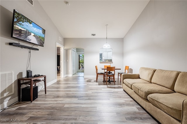 living room with light hardwood / wood-style floors