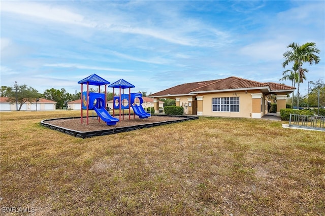 view of play area with a yard