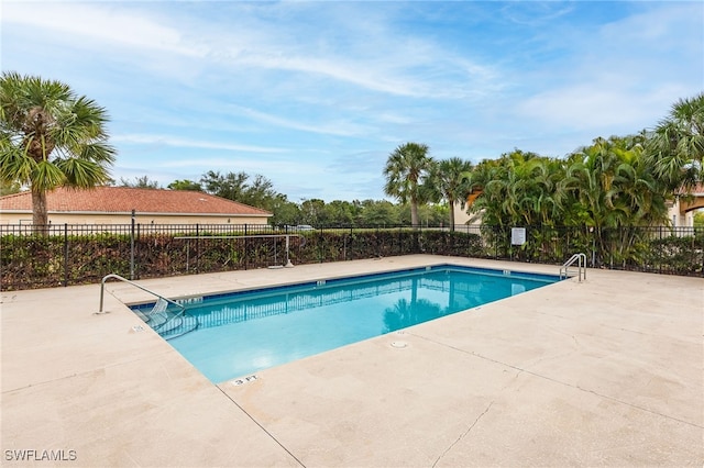 view of pool featuring a patio area