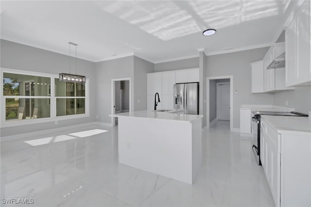 kitchen featuring appliances with stainless steel finishes, sink, white cabinetry, and an island with sink