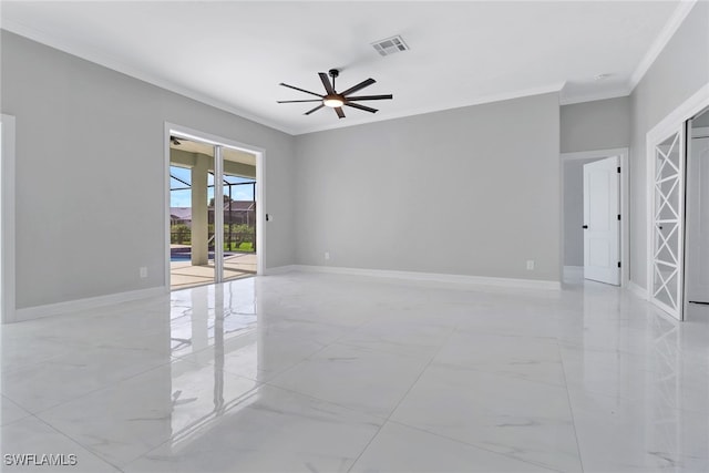 spare room featuring ceiling fan and ornamental molding