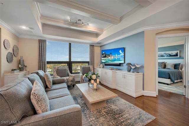 living area featuring ornamental molding, dark wood finished floors, a tray ceiling, baseboards, and recessed lighting
