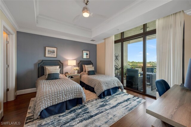 bedroom featuring access to outside, wood finished floors, a raised ceiling, ornamental molding, and ceiling fan