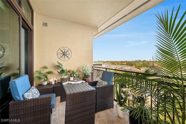 balcony featuring visible vents