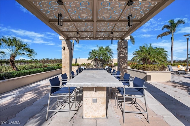 view of patio / terrace featuring outdoor dry bar