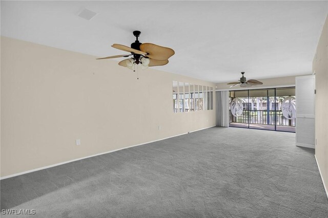 unfurnished living room with carpet, ceiling fan, and lofted ceiling