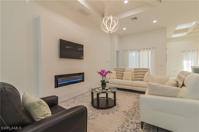 living room featuring a notable chandelier