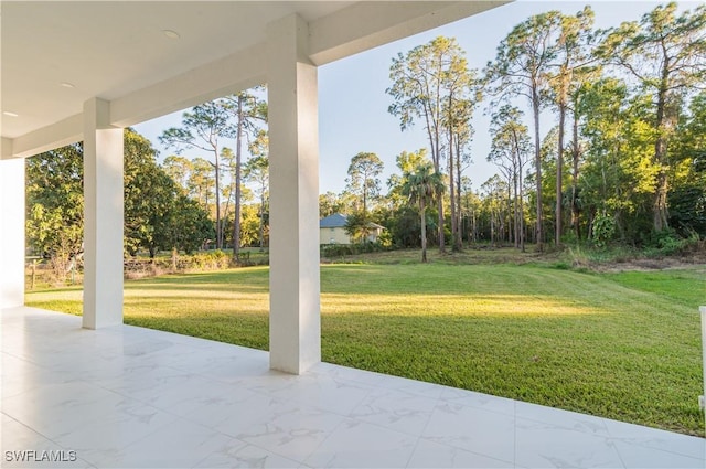 view of yard with a patio area