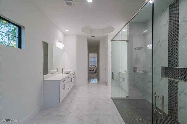 bathroom with vanity and an enclosed shower