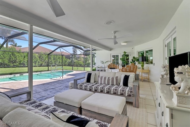 view of patio with an outdoor pool, glass enclosure, an outdoor living space, and ceiling fan