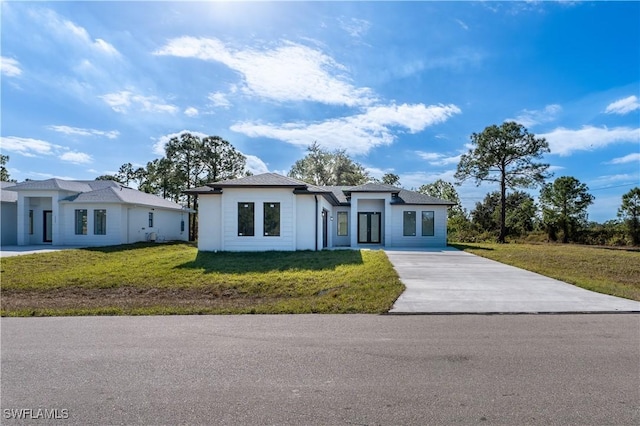 view of front of home with a front yard