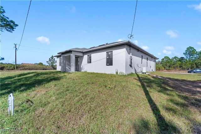 exterior space with a yard