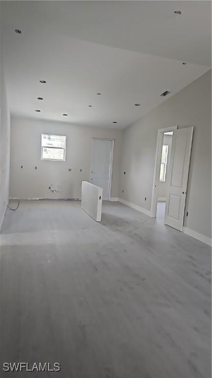 2618 25th St W, Lehigh Acres, FL 33971 - spare room with healthy amount of natural light and baseboards