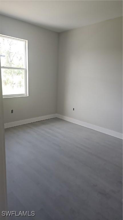 2618 25th St W, Lehigh Acres, FL 33971 - unfurnished room featuring baseboards