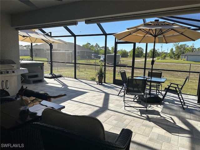 view of patio with a lanai