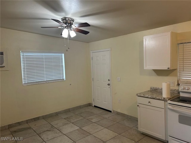 kitchen with white electric range oven, ceiling fan, stone counters, white cabinets, and light tile patterned flooring