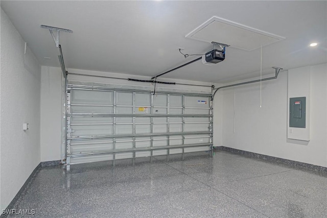 garage with a garage door opener and electric panel