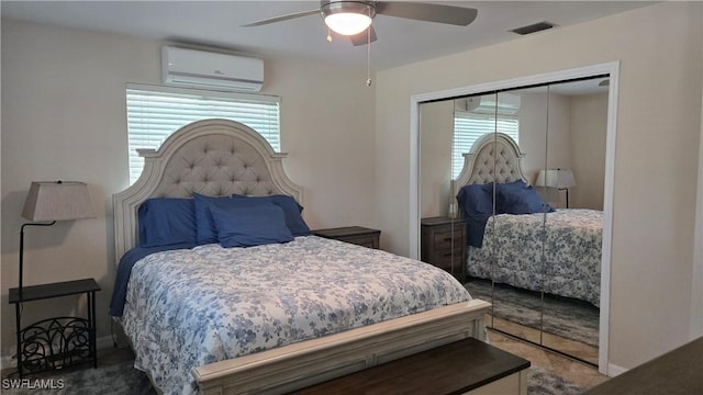 bedroom featuring a wall mounted air conditioner, multiple windows, a closet, and ceiling fan