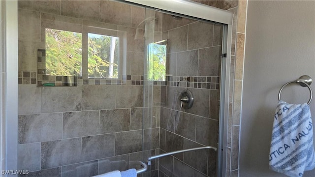 bathroom with an enclosed shower