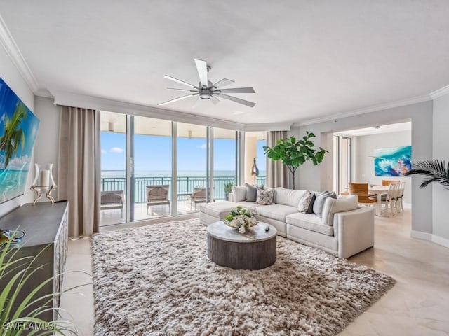 living room with floor to ceiling windows, ornamental molding, and ceiling fan