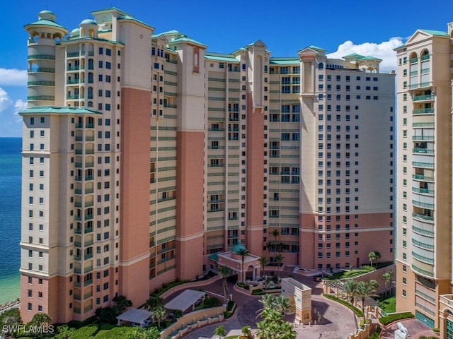 view of property with a water view