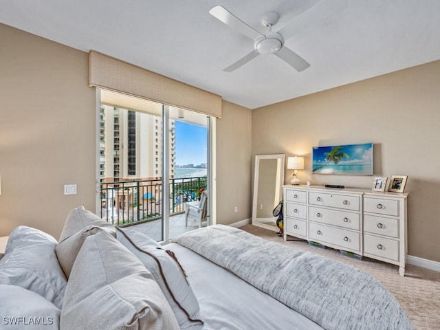 carpeted bedroom with ceiling fan and access to exterior