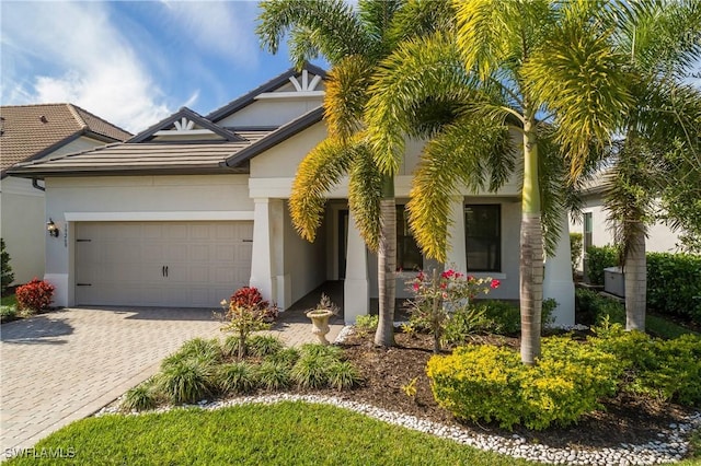 view of front of home with a garage