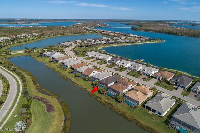 drone / aerial view featuring a water view