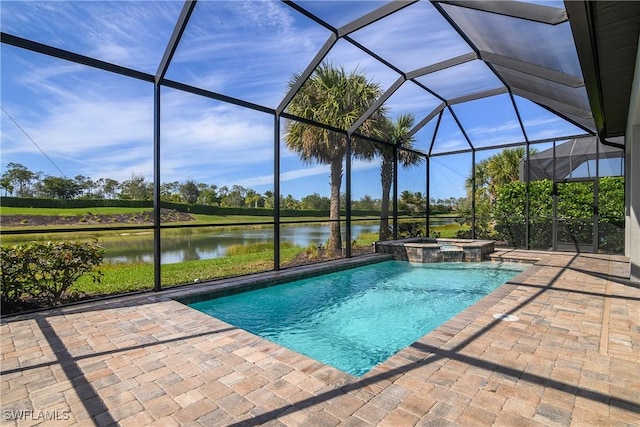 view of swimming pool with an in ground hot tub, a water view, glass enclosure, and a patio