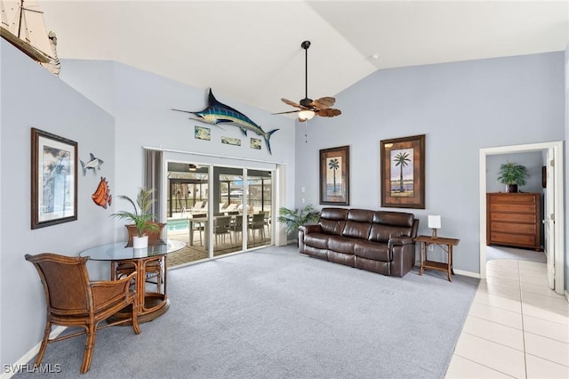 living room with ceiling fan, light carpet, and high vaulted ceiling