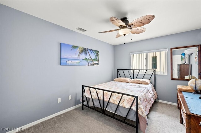 bedroom with ceiling fan and carpet