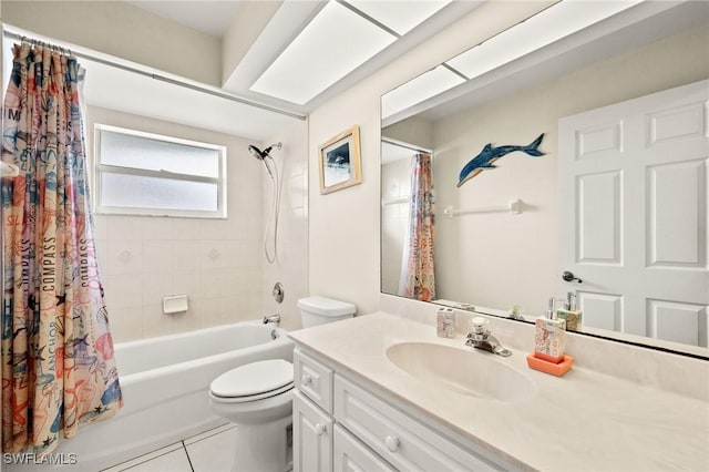 full bathroom with toilet, tile patterned floors, vanity, and shower / bath combo