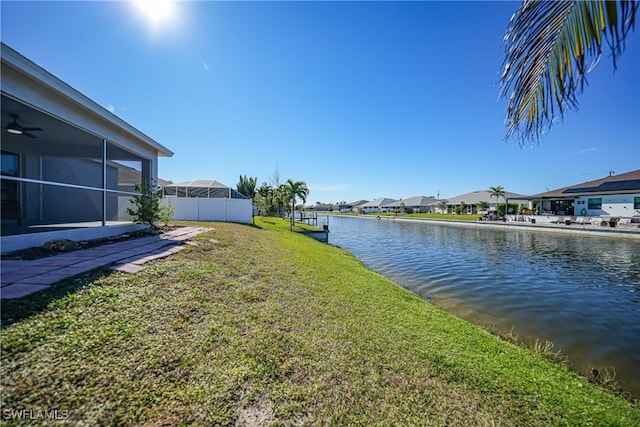 water view with a residential view and fence