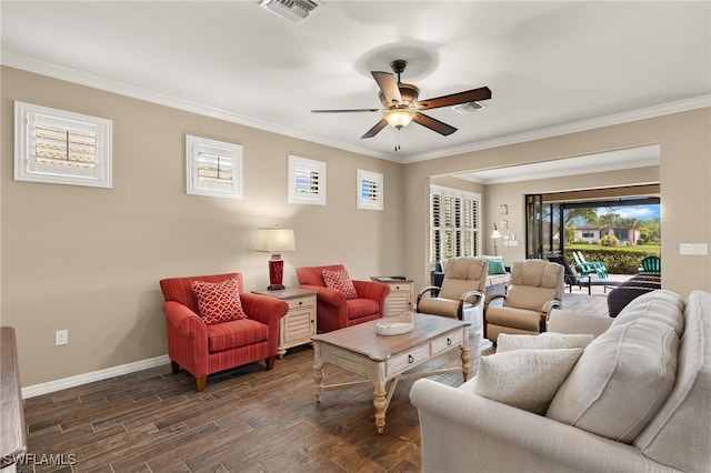 living room with ceiling fan and crown molding