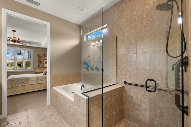 bathroom featuring separate shower and tub, ceiling fan, and tile patterned flooring