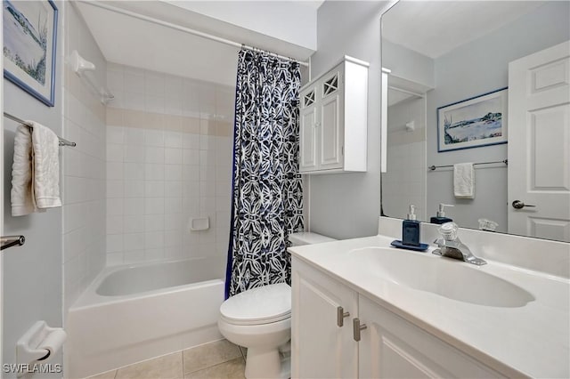 full bathroom with tile patterned floors, vanity, toilet, and shower / tub combo