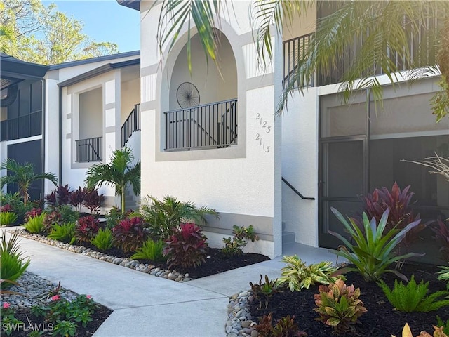 entrance to property featuring a balcony