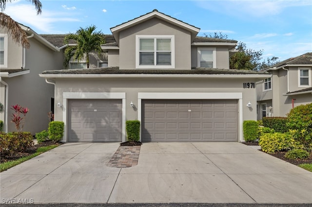 view of property with a garage