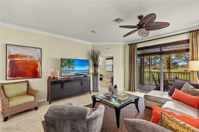 tiled living room with ceiling fan and ornamental molding