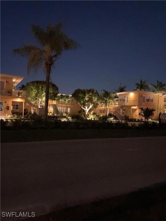 view of yard at twilight